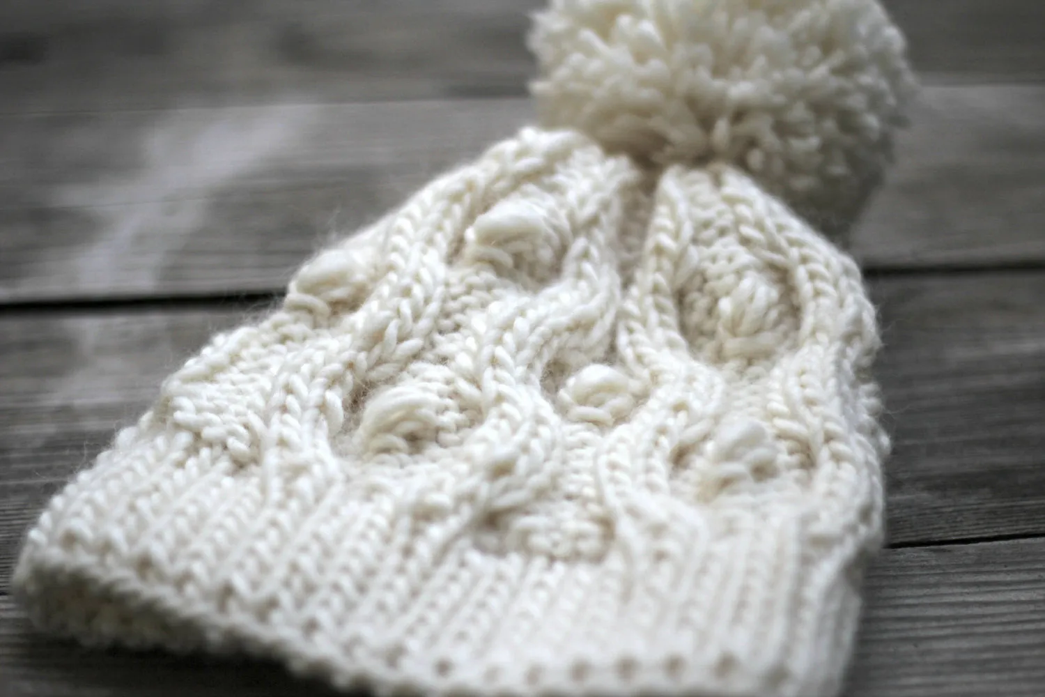 Knit beanie hat in white cream color with pom pom, winter accessories