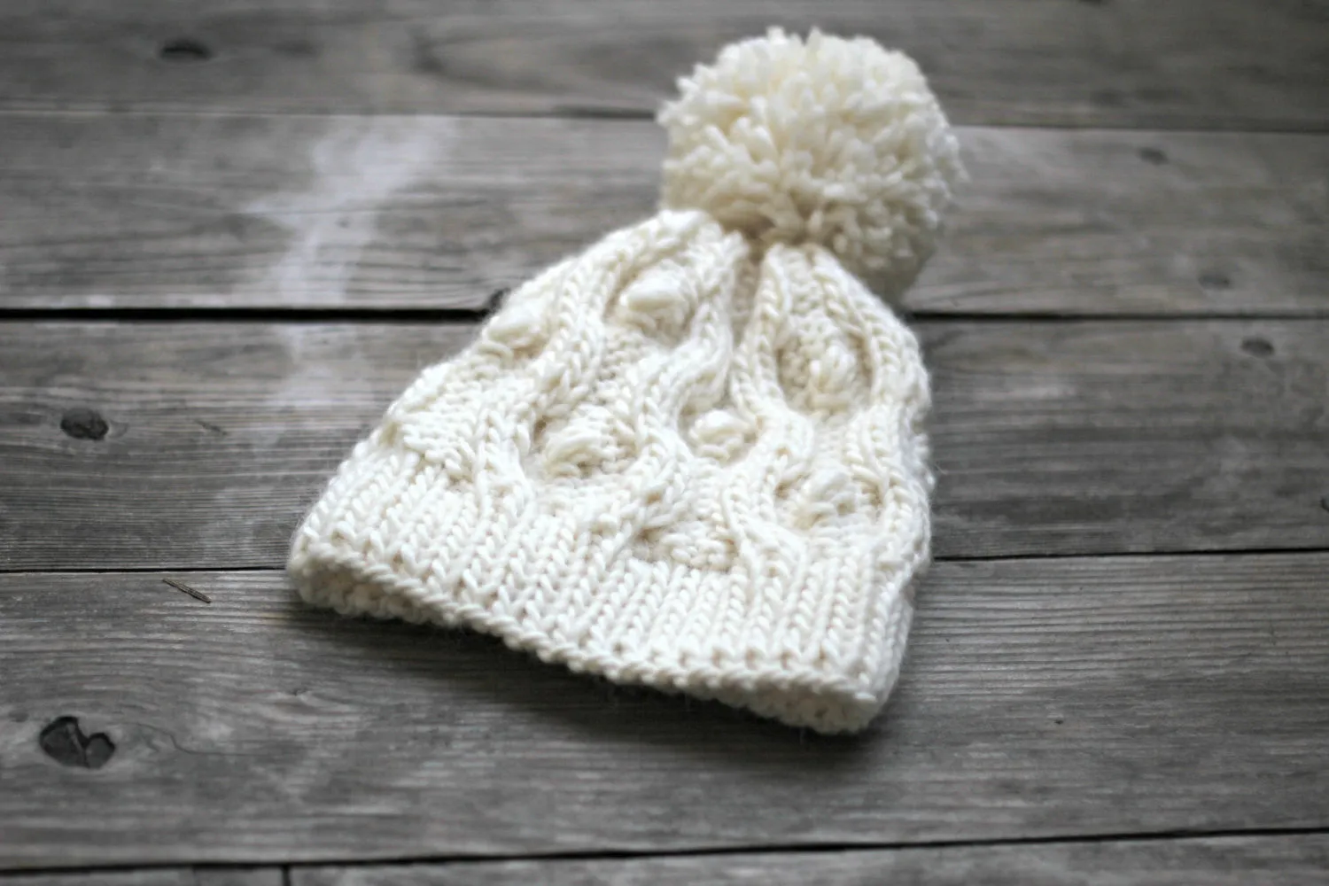 Knit beanie hat in white cream color with pom pom, winter accessories